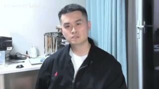 Wang Tianyi speaking to the camera from his room